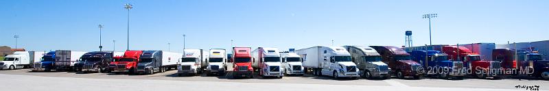 20080714_115031 D3 4200x700.jpg - Trucks in parking lot Iowa-80 truck stop